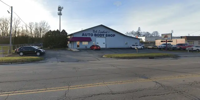 The Bob Lambert Auto Body shop building with its sign on Doctor MLK Jr Blvd in Muncie